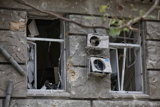 Broken air conditioner units hang between two shattered windows in a four-storey apartment block damaged by a Russian combined strike, Odesa, Ukraine, July 21, 2026. The Russian army carried out a missile and drone attack on the southern Ukrainian port city and the region. The attack damaged the residential building, nearby structures and cars. Three people were injured. (Photo by Nina Liashonok Ukrinform) Russians attack historical centre in Odesa  Copyright: xNinaxLiashonokx