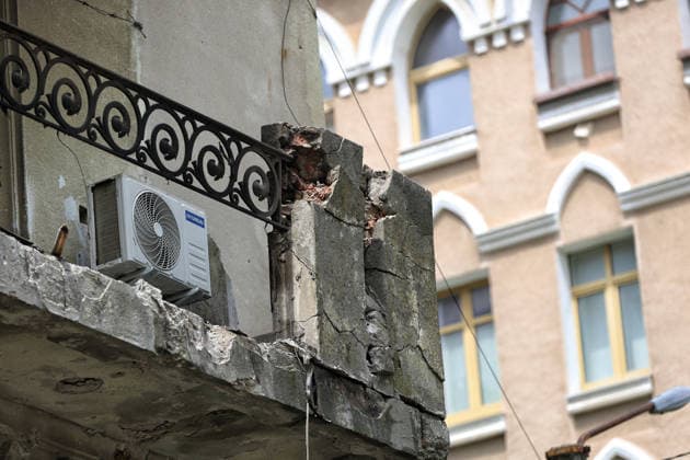 An air conditioner unit hangs on the facade of a four-storey apartment block damaged by a Russian combined strike, Odesa, Ukraine, July 21, 2026. The Russian army carried out a missile and drone attack on the southern Ukrainian port city and the region. The attack damaged the residential building, nearby structures and cars. Three people were injured.(Photo by Nina Liashonok Ukrinform) Russians attack historical centre in Odesa  Copyright: xNinaxLiashonokx