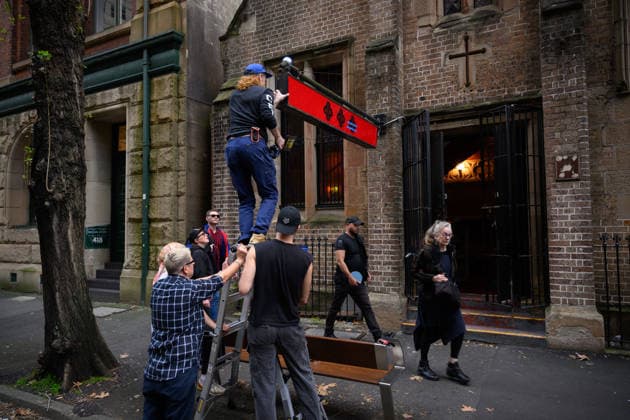 DIVINE PLAYHOUSE EVICTION, Devine Playhouse members clean and pack up at the former church turned LGBTQ arts space, the Devine Playhouse, in Sydney, Wednesday, July 22, 2026. The group has been forced out of the space after the owners of the deconsecrated church in Sydney s CBD have terminated the lease following complaints from some members of the Christian community. ( NO ARCHIVING SYDNEY NEW SOUTH WALES AUSTRALIA  Copyright: xDANxHIMBRECHTSx 20260722174734095740