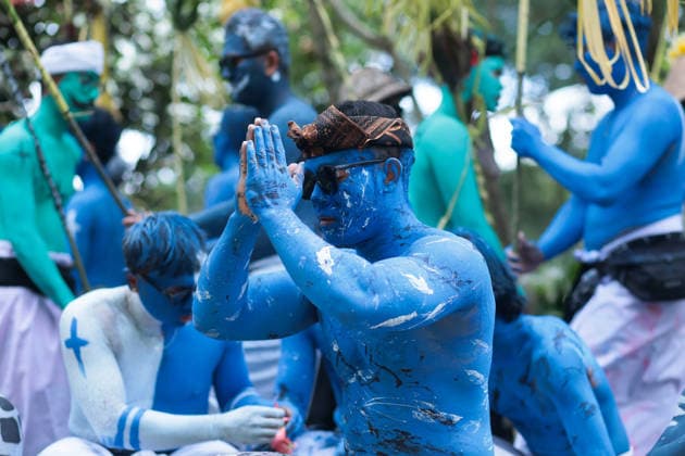 Ngerebeg ritual, a colorful tradition in Bali BALI, INDONESIA - JULY 22: Locals with painted bodies participate in the Ngerebeg ritual, a colorful traditional procession believed to expel evil spirits and bad luck from the village, on July 22, 2026 in Bali, Indonesia. Participants paint their bodies to resemble astral beings as they pray and march through the village. Johannes P. Christo Anadolu Bali Indonesia. Editorial use only. Please get in touch for any other usage.  Copyright: x2026xAnadoluxJohannesxP.xChristox