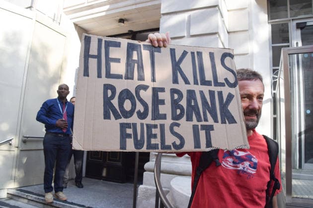 July 22, 2026, London, England, United Kingdom: Climate activists from Fossil Free London stage a protest outside the Department for Energy Security and Net Zero calling on the new Energy Secretary Miatta Fahnbulleh and the new UK Prime Minister Andy Burnham to stop the Rosebank oil and gas field in the North Sea. London United Kingdom - ZUMAv130 20260722_zip_v130_024 Copyright: xVukxValcicx