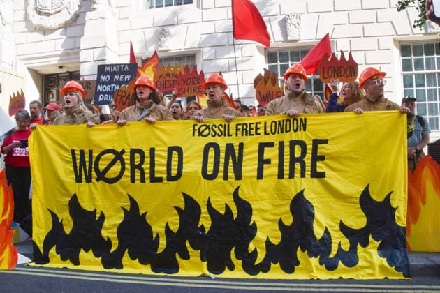 July 22, 2026, London, England, United Kingdom: Climate activists from Fossil Free London dressed as firefighters stage a protest outside the Department for Energy Security and Net Zero calling on the new Energy Secretary Miatta Fahnbulleh and the new UK Prime Minister Andy Burnham to stop the Rosebank oil and gas field in the North Sea. London United Kingdom - ZUMAv130 20260722_zip_v130_033 Copyright: xVukxValcicx
