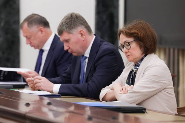 RUSSIA, MOSCOW - JULY 22, 2026: Russia s Minister of Economic Development Maxim Reshetnikov (C) and Russian Central Bank Governor Elvira Nabiullina (R) during a government meeting chaired by Russia s President Putin (not pictured) to discuss economic issues. Alexander Kazakov Russian Presidential Press and Information Office TASS  95321057