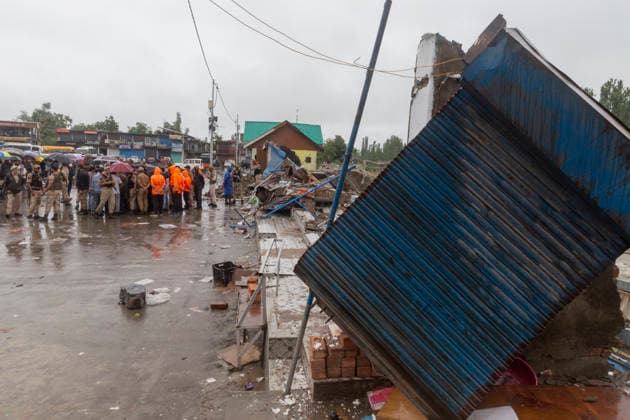 July 22, 2026, Budgam, Jammu And Kashmir, India: A general view shows the site where a shopping complex is damaged by flash floods following heavy rain in Beerwah. The severe weather leaves at least 22 people dead in the Poonch and Rajouri districts, forces the closure of educational institutions until July 26, and leads to the suspension of the Amarnath Yatra. Budgam India - ZUMAa205 20260722_zip_a205_009 Copyright: xAdilxAbassx