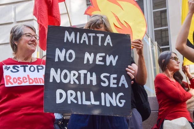 July 22, 2026, London, United Kingdom: A protester holds a Miatta no new North Sea drilling placard during a protest outside the Department for Energy Security and Net Zero (DESNZ) organised by the group Fossil Free London, calling on the new Energy Secretary Miatta Fahnbulleh and the new UK Prime Minister Andy Burnham to stop the Rosebank oil and gas field in the North Sea. London United Kingdom - ZUMAs197 20260722_aaa_s197_037 Copyright: xVukxValcicx