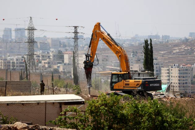 Israeli forces demolish structures in Jerusalem RAFAT, JERUSALEM - JULY 22: Israeli forces, accompanied by bulldozers, carry out a raid in the town of Rafat, northwest of East Jerusalem, on July 22, 2026. During the operation, Israeli authorities demolished a residential house, a car wash facility and two farms, claiming the structures had been built without the required permits. Issam Rimawi Anadolu Jerusalem Rafat. Editorial use only. Please get in touch for any other usage.  Copyright: x2026xAnadoluxIssamxRimawix