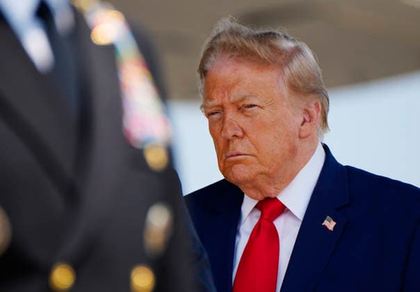 President Donald Trump attends the dignified transfer of Army 1st Lt. Tyler James Feehan, Army Staff Sgt. Emmanuel Swinton, Army Sgt. Angel Rampersad and Army Pvt. Isabella Gonzales at Dover Air Force Base in Dover, Delaware on Wednesday, July 22, 2026.  DEL202607222001 BONNIExCASH
