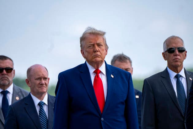 President Donald Trump attends the dignified transfer of Army 1st Lt. Tyler James Feehan, Army Staff Sgt. Emmanuel Swinton, Army Sgt. Angel Rampersad and Army Pvt. Isabella Gonzales at Dover Air Force Base in Dover, Delaware on Wednesday, July 22, 2026.  WAP20260722363 BONNIExCASH