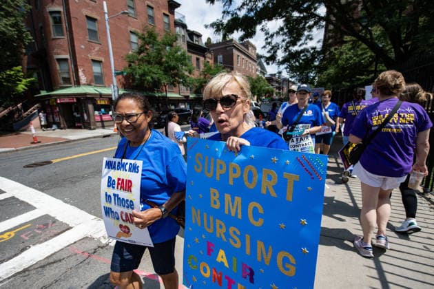 Nurses stage protest for better pay and working conditions in Boston BOSTON, UNITED STATES - JULY 22: Nurses picket outside of Boston Medical Center for a new contract that offers better pay and safer working conditions in Boston, Massachusetts, United States, on July 22, 2026. Joseph Prezioso Anadolu Boston United States. Editorial use only. Please get in touch for any other usage.  Copyright: x2026xAnadoluxJosephxPreziosox