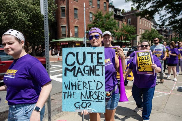 Nurses stage protest for better pay and working conditions in Boston BOSTON, UNITED STATES - JULY 22: Nurses picket outside of Boston Medical Center for a new contract that offers better pay and safer working conditions in Boston, Massachusetts, United States, on July 22, 2026. Joseph Prezioso Anadolu Boston United States. Editorial use only. Please get in touch for any other usage.  Copyright: x2026xAnadoluxJosephxPreziosox