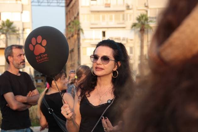 July 22, 2026, Â°Zmir, ToÂ¼rkiye: IZMIR, TURKEY Ã¢â‚¬ JULY 22, 2026: Participants dressed in black walk silently from Pasaport Ferry Terminal to Alsancak Ferry Terminal during an awareness march organized by volunteers to highlight the welfare and rights of stray animals. Carrying black balloons bearing the words One Life Lost, demonstrators complete the march without chanting slogans before delivering a brief press statement at the end of the route. Â°Zmir Türkiye  - ZUMAq101 20260722_zna_q101_218 Copyright: xNagihanxCakirx