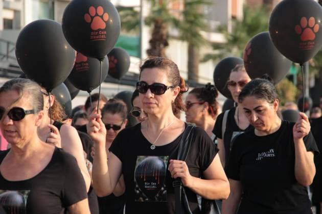 July 22, 2026, Â°Zmir, ToÂ¼rkiye: IZMIR, TURKEY Ã¢â‚¬ JULY 22, 2026: Participants dressed in black walk silently from Pasaport Ferry Terminal to Alsancak Ferry Terminal during an awareness march organized by volunteers to highlight the welfare and rights of stray animals. Carrying black balloons bearing the words One Life Lost, demonstrators complete the march without chanting slogans before delivering a brief press statement at the end of the route. Â°Zmir Türkiye - ZUMAq101 20260722_zna_q101_210 Copyright: xNagihanxCakirx
