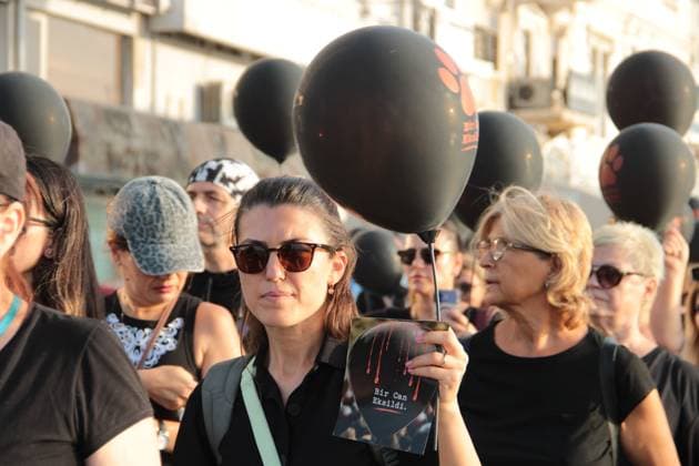 July 22, 2026, Â°Zmir, ToÂ¼rkiye: IZMIR, TURKEY Ã¢â‚¬ JULY 22, 2026: Participants dressed in black walk silently from Pasaport Ferry Terminal to Alsancak Ferry Terminal during an awareness march organized by volunteers to highlight the welfare and rights of stray animals. Carrying black balloons bearing the words One Life Lost, demonstrators complete the march without chanting slogans before delivering a brief press statement at the end of the route. Â°Zmir Türkiye - ZUMAq101 20260722_zna_q101_213 Copyright: xNagihanxCakirx