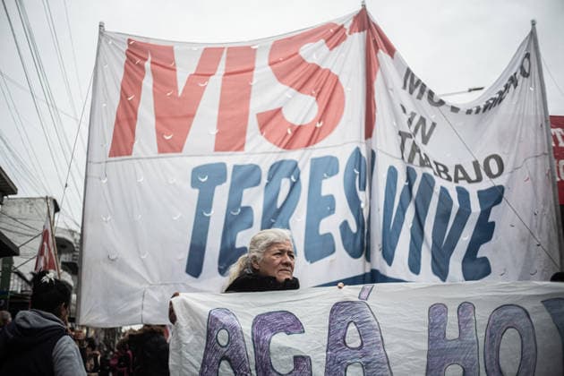 July 22, 2026, Buenos Aires, Buenos Aires, Argentina: Members of social organizations, labor unions and left-wing groups take part in a nationwide day of protest in Buenos Aires, Argentina, demanding increased social assistance, food programs and employment measures amid the country s ongoing economic crisis. Demonstrators marched at the PueyrredoÂ³n Bridge, where clashes erupted with federal security forces after police attempted to block the protest. The mobilization was part of coordinated actions held across Argentina. July 22, 2026. Buenos Aires Argentina  - ZUMAf175 20260722_zip_f175_018 Copyright: xDaniellaxFernandezxRealinx