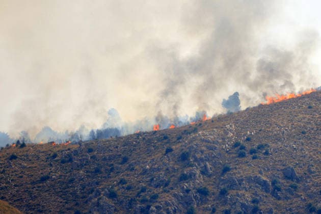 Wildfire firefighting efforts continue on Sicily island PALERMO, ITALY - JULY 22: Wildfires continue to burn in several parts of Sicily as firefighting efforts remain underway in Palermo, Sicily, Italy on July 22, 2026. Aircraft and helicopters are being used to battle a wildfire in the Casaboli forest, located in the mountainous area between the towns of Monreale and Pioppo near Palermo. Alberto Lo Bianco Anadolu Palermo Italy. Editorial use only. Please get in touch for any other usage.  Copyright: x2026xAnadoluxAlbertoxLoxBiancox