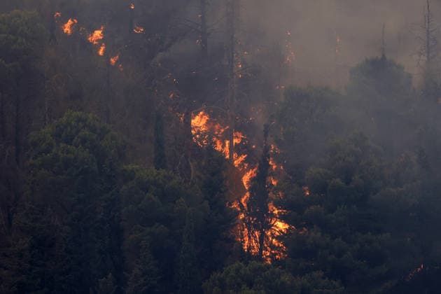Wildfire firefighting efforts continue on Sicily island PALERMO, ITALY - JULY 22: Wildfires continue to burn in several parts of Sicily as firefighting efforts remain underway in Palermo, Sicily, Italy on July 22, 2026. Aircraft and helicopters are being used to battle a wildfire in the Casaboli forest, located in the mountainous area between the towns of Monreale and Pioppo near Palermo. Alberto Lo Bianco Anadolu Palermo Italy. Editorial use only. Please get in touch for any other usage.  Copyright: x2026xAnadoluxAlbertoxLoxBiancox