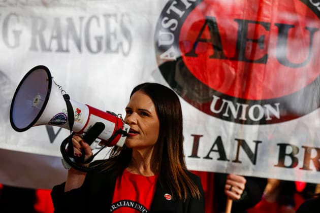 The Victoria State Teachers Strike Protest in Melbourne - 23 Jul 2026 Briley Stokes, Deputy President of the Australian Education Union (AEU) Victoria Branch, speaks during the demonstration. Hundreds of members of the Australian Education Union (AEU) marched from Bourke Street Mall to the Victorian Parliament in Melbourne, calling for better pay, improved working conditions, increased public school funding, and a revised Victorian Government Schools Agreement (VGSA). Melbourne Australia Copyright: xYexMyoxKhantx xSOPAxImagesx YeMyoKhant_11