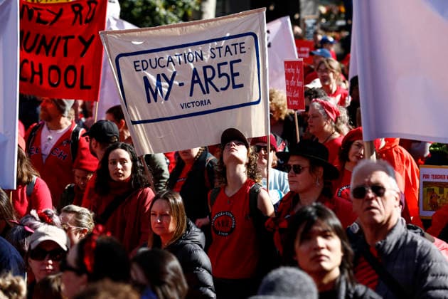 The Victoria State Teachers Strike Protest in Melbourne - 23 Jul 2026 Protesters hold placards during the rally. Hundreds of members of the Australian Education Union (AEU) marched from Bourke Street Mall to the Victorian Parliament in Melbourne, calling for better pay, improved working conditions, increased public school funding, and a revised Victorian Government Schools Agreement (VGSA). Melbourne Australia Copyright: xYexMyoxKhantx xSOPAxImagesx YeMyoKhant_21