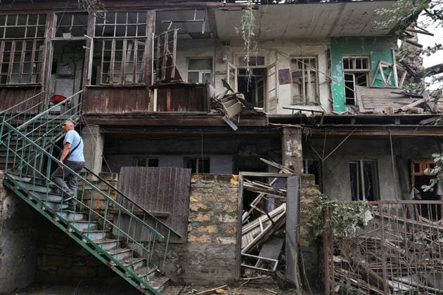 A man goes up the stairs at a two-storey apartment block partially destroyed by a Russian drone attack, Odesa, Ukraine, July 22, 2026. In the morning, the Russian army struck the southern port city with attack drones, killing a man and injuring two people - an 82-year-old woman and a 54-year-old man. (Photo by Nina Liashonok Ukrinform) Russian army attacks Odesa with drones, killing 1 man  Copyright: xNinaxLiashonokx