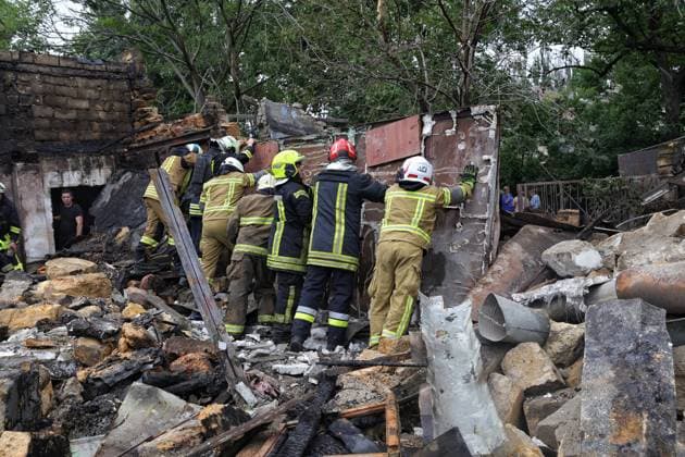 Rescuers clear the rubble at a two-storey residential building partially destroyed by a Russian drone attack, Odesa, Ukraine, July 22, 2026. In the morning, the Russian army struck the southern port city with attack drones, killing a man and injuring two people - an 82-year-old woman and a 54-year-old man. (Photo by Nina Liashonok Ukrinform) Russian army attacks Odesa with drones, killing 1 man  Copyright: xNinaxLiashonokx