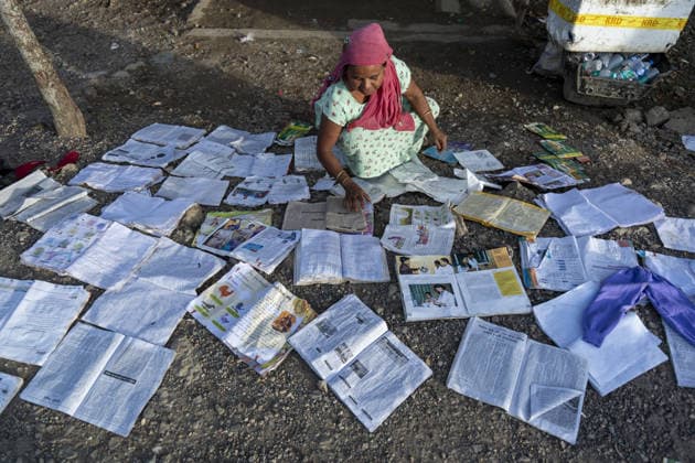 Flood in Indian Northeastern State Assam JORHAT, INDIA - JULY 22: A flood-affected resident dries water-damaged schoolbooks, notebooks and documents beside a roadside, on July 22, 2026 in Jorhat, India. The flood situation in Assam remained critical, with more than 630,000 people affected across 21 districts. The state’s death toll has risen to 12. David Talukdar Anadolu Jorhat India. Editorial use only. Please get in touch for any other usage.  Copyright: x2026xAnadoluxDavidxTalukdarx