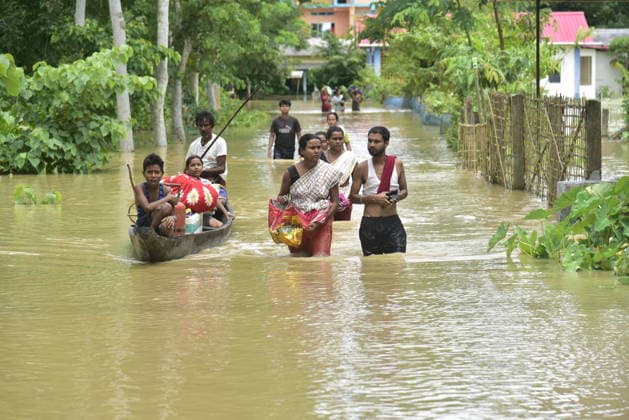 Heavy rainfall triggers severe flooding in Assam, India SIVSAGAR, INDIA - JULY 23: People walk through flooded streets while others use a sandal to get by after heavy rainfall affects areas in Sivsagar district, Assam, India on July 23, 2026. Continuous heavy rainfall over the past few days has triggered severe flooding across several parts of Sivsagar district in Assam, leaving thousands of residents affected and disrupting normal life. Hafiz Ahmed Anadolu Sivsagar India. Editorial use only. Please get in touch for any other usage.  Copyright: x2026xAnadoluxHafizxAhmedx