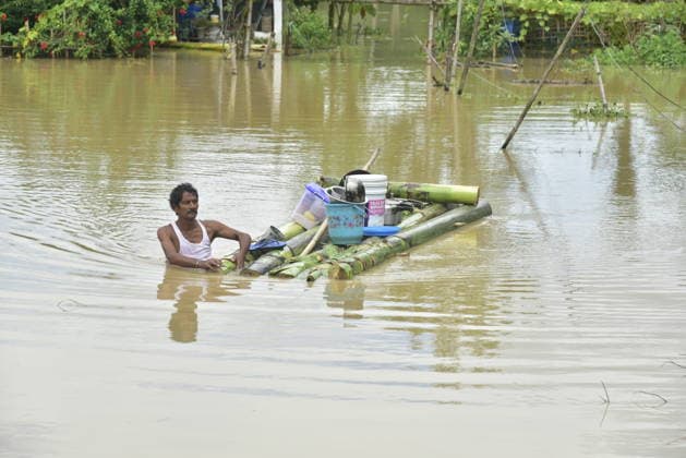 Heavy rainfall triggers severe flooding in Assam, India SIVSAGAR, INDIA - JULY 23: People walk through flooded streets after heavy rainfall affects areas in Sivsagar district, Assam, India on July 23, 2026. Continuous heavy rainfall over the past few days has triggered severe flooding across several parts of Sivsagar district in Assam, leaving thousands of residents affected and disrupting normal life. Hafiz Ahmed Anadolu Sivsagar India. Editorial use only. Please get in touch for any other usage.  Copyright: x2026xAnadoluxHafizxAhmedx
