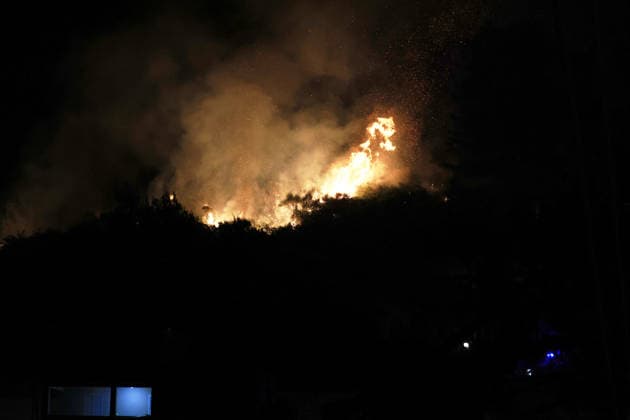 Wildfire threatens communities near Palermo in Sicily as firefighting efforts continue PALERMO, ITALY - JULY 23: Firefighters and civil protection teams battle a wildfire in the Casaboli Forest near Palermo as strong winds push the blaze toward the towns of Monreale, Pioppo and Sagana, while residents are evacuated from threatened homes, in Palermo, Sicily, Italy on July 23, 2026. The wildfire, which started the previous day, spread overnight, prompting emergency crews to work continuously to contain the flames and protect nearby communities. Alberto Lo Bianco Anadolu Palermo Italy. Editorial use only. Please get in touch for any other usage.  Copyright: x2026xAnadoluxAlbertoxLoxBiancox