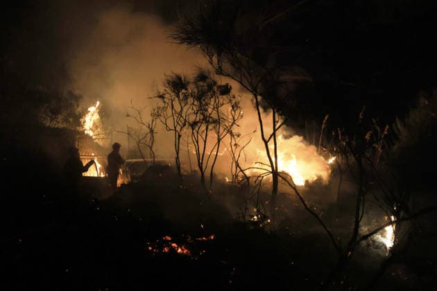 Wildfire threatens communities near Palermo in Sicily as firefighting efforts continue PALERMO, ITALY - JULY 23: Firefighters and civil protection teams battle a wildfire in the Casaboli Forest near Palermo as strong winds push the blaze toward the towns of Monreale, Pioppo and Sagana, while residents are evacuated from threatened homes, in Palermo, Sicily, Italy on July 23, 2026. The wildfire, which started the previous day, spread overnight, prompting emergency crews to work continuously to contain the flames and protect nearby communities. Alberto Lo Bianco Anadolu Palermo Italy. Editorial use only. Please get in touch for any other usage.  Copyright: x2026xAnadoluxAlbertoxLoxBiancox