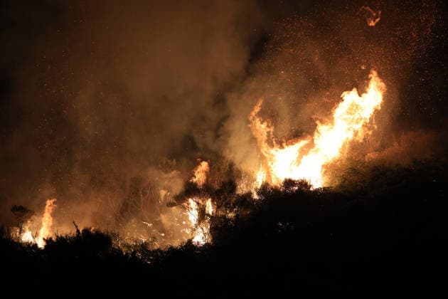 Wildfire threatens communities near Palermo in Sicily as firefighting efforts continue PALERMO, ITALY - JULY 23: Firefighters and civil protection teams battle a wildfire in the Casaboli Forest near Palermo as strong winds push the blaze toward the towns of Monreale, Pioppo and Sagana, while residents are evacuated from threatened homes, in Palermo, Sicily, Italy on July 23, 2026. The wildfire, which started the previous day, spread overnight, prompting emergency crews to work continuously to contain the flames and protect nearby communities. Alberto Lo Bianco Anadolu Palermo Italy. Editorial use only. Please get in touch for any other usage.  Copyright: x2026xAnadoluxAlbertoxLoxBiancox