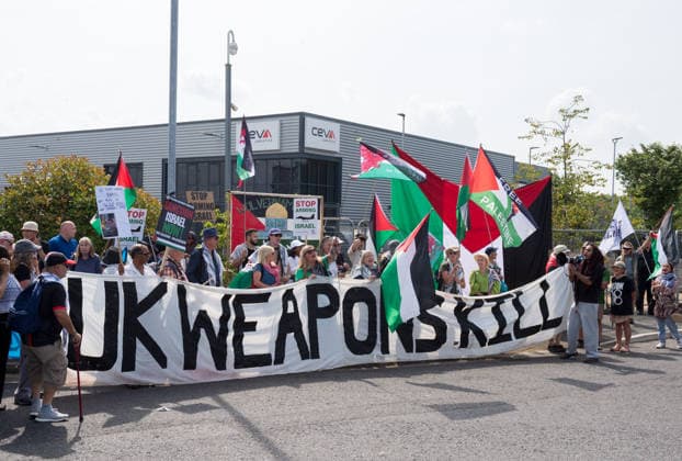 July 23, 2026, Bristol, Bristol, UK: Bristol, UK. A national protest calling for a full arms embargo on Israel takes place at the Israeli owned Elbit Systems production site in Filton. The protest is called by the Palestine Solidarity Campaign who say that Elbit Systems produces weapons and military technology used by Israel for genocide in the Gaza Strip, and military operations in the West Bank. PSC say the British government facilitates the export of weapons and military technology to Israel despite knowing it is to commit genocide. Bristol UK  - ZUMAl94_ 20260723_zaf_l94_023 Copyright: xSimonxChapmanx