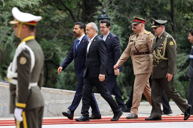 Iraqi Prime Minister Ali al-Zaidi in Iran TEHRAN, IRAN - JULY 23: RESTRICTIONS: NO Access Israel Media Persian Language TV Stations Outside Iran Strictly No Access BBC Persian VOA Persian Manoto TV Iran International TV (----EDITORIAL USE ONLY MANDATORY CREDIT - IRANIAN PRESIDENCY HANDOUT - NO MARKETING NO ADVERTISING CAMPAIGNS - DISTRIBUTED AS A SERVICE TO CLIENTS----) Iraqi Prime Minister Ali al-Zaidi is welcomed by Iranian President Masoud Pezeshkian with official ceremony in Tehran, Iran on July 23, 2026. Iranian Presidency Handout Anadolu Tehran Iran. Editorial use only. Please get in touch for any other usage.  Copyright: x2026xAnadoluxIranianxPresidencyx xHandoutx