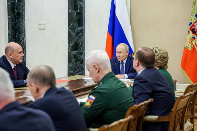 RUSSIA, MOSCOW - JULY 23, 2026: President Vladimir Putin (R back) chairs a meeting of the Russian Security Council at the Moscow Kremlin. Alexander Kazakov Russian Presidential Press and Information Office TASS  95359247