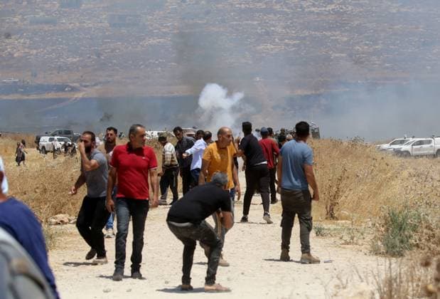 July 23, 2026, Beit Furik, Palestine, State of: BEIT FURIK, WEST BANK Ã¢â‚¬ JULY 23, 2026: Israeli settlers reportedly attack Palestinian farmers as they attempt to extinguish fires in wheat fields in the town of Beit Furik, east of Nablus, in the occupied West Bank. According to Palestinian residents, the fires were allegedly set by Israeli settlers before the confrontation. Beit Furik Palestine, State of - ZUMAq101 20260723_zna_q101_073 Copyright: xNedalxShtiehx