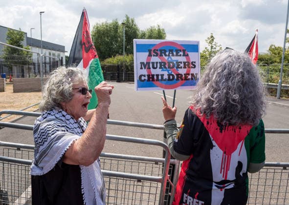 July 23, 2026, Bristol, Bristol, UK: Bristol, UK. A national protest calling for a full arms embargo on Israel takes place at the Israeli owned Elbit Systems production site in Filton. The protest is called by the Palestine Solidarity Campaign who say that Elbit Systems produces weapons and military technology used by Israel for genocide in the Gaza Strip, and military operations in the West Bank. PSC say the British government facilitates the export of weapons and military technology to Israel despite knowing it is to commit genocide. Bristol UK  - ZUMAl94_ 20260723_zaf_l94_047 Copyright: xSimonxChapmanx