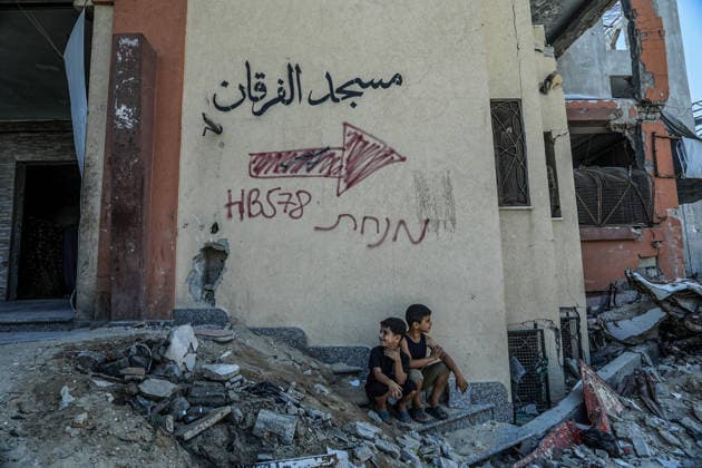 Life in the shadow of destruction in Khan Yunis KHAN YUNIS, GAZA, PALESTINE - JULY 23: Displaced Palestinian families, uprooted by ongoing intensive Israeli attacks across the Gaza Strip, take shelter in the severely damaged Al-Furqan Mosque in Khan Yunis, Gaza, Palestine on July 23, 2026. Deprived of basic necessities, civilians living in the damaged building are struggling with poor hygienic conditions and health issues caused by rodents and pests. Abed Rahim Khatib Anadolu Khan Yunis Gaza. Editorial use only. Please get in touch for any other usage.  Copyright: x2026xAnadoluxAbedxRahimxKhatibx