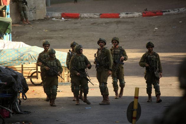 Israeli security forces deploy in Hebron city center Members of the Israeli security forces deploy in the Bab al-Zawiya area in the center of the West Bank city of Hebron on July 23, 2026, while closing streets and restricting the movement of Palestinians to secure the entry of Israeli settlers into the area, according to witnesses. Residents said the measures disrupted daily movement and forced a number of shops to close during the settlers visit. Photo by Mamoun Wazwaz apaimages Hebron West Bank Palestinian Territory 230726_Hebron_MW_00(39) Copyright: xapaimagesxMamounxWazwazx xapaimagesx