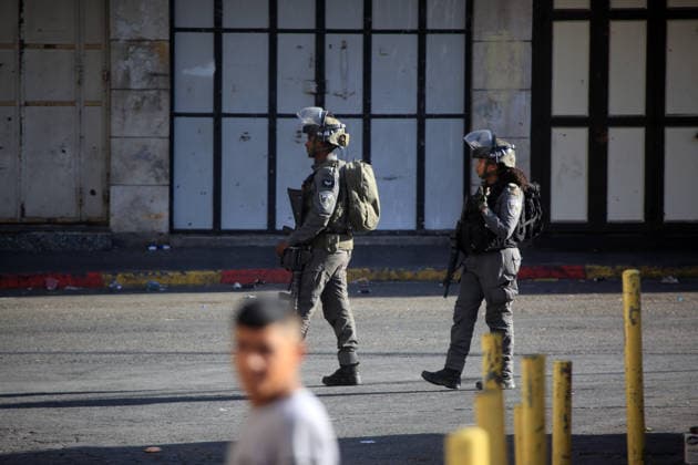 Israeli security forces deploy in Hebron city center Members of the Israeli security forces deploy in the Bab al-Zawiya area in the center of the West Bank city of Hebron on July 23, 2026, while closing streets and restricting the movement of Palestinians to secure the entry of Israeli settlers into the area, according to witnesses. Residents said the measures disrupted daily movement and forced a number of shops to close during the settlers visit. Photo by Mamoun Wazwaz apaimages Hebron West Bank Palestinian Territory 230726_Hebron_MW_00(26) Copyright: xapaimagesxMamounxWazwazx xapaimagesx