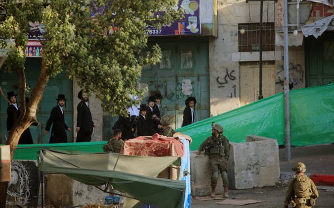 Israeli security forces deploy in Hebron city center Members of the Israeli security forces deploy in the Bab al-Zawiya area in the center of the West Bank city of Hebron on July 23, 2026, while closing streets and restricting the movement of Palestinians to secure the entry of Israeli settlers into the area, according to witnesses. Residents said the measures disrupted daily movement and forced a number of shops to close during the settlers visit. Photo by Mamoun Wazwaz apaimages Hebron West Bank Palestinian Territory 230726_Hebron_MW_00(38) Copyright: xapaimagesxMamounxWazwazx xapaimagesx