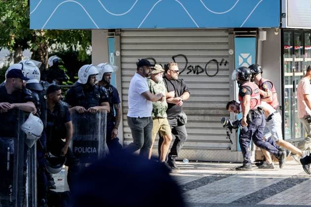 July 23, 2026, Tirana, Albania: TIRANA, ALBANIA Ã¢â‚¬ JULY 23, 2026: Demonstrators gathered outside the Albanian Parliament during the fifty-fourth consecutive day of anti-government protests in Tirana, Albania, on July 23, 2026. Protesters attempted to block lawmakers arriving for the parliamentary session, leading to confrontations with riot police. Officers deployed water cannons, pepper spray and physical force as clashes broke out outside the parliament building. Several demonstrators were detained, while both protesters and police officers sustained injuries during the unrest. The protest movement, which began in opposition to a proposed luxury tourism development project linked to Jared Kushner and other international investors, h  - ZUMAq101 20260723_zna_q101_153 Copyright: xVlasovxSulajx