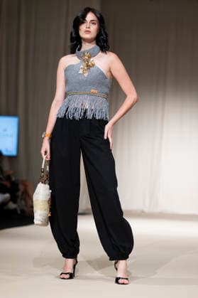 UNIENDO MODA - MOMAD Fashion Week de Madrid ,Spain - 23 Jul 2026 A model walks the runway wearing a design by UNIENDO MODA during the Momad Fashion Week de Madrid in IFEMA. Madrid Spain Copyright: xAtilanoxGarciax xSOPAxImagesx photo02994