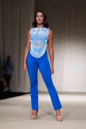 July 23, 2026, Madrid, Spain: A model walks the runway wearing a design by UNIENDO MODA during the Momad Fashion Week de Madrid in IFEMA. Madrid Spain  - ZUMAs197 20260723_aaa_s197_048 Copyright: xAtilanoxGarciax