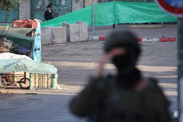 July 23, 2026, Hebron, Palestine, State of: HEBRON, WEST BANK Ã¢â‚¬ JULY 23, 2026: Israeli forces closed the central market and restricted the movement of Palestinians in the city of Hebron during a raid on the area to secure settlers access to the Tomb of the Patriarchs, where they performed Jewish prayers, on July 23, 2026. Hebron Palestine, State of - ZUMAq101 20260723_zna_q101_160 Copyright: xMosabxShawerx