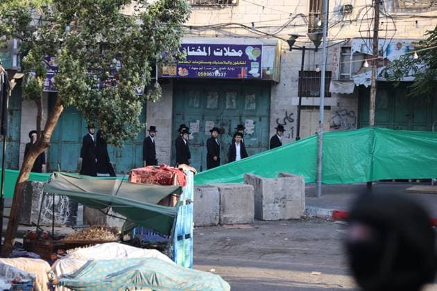 July 23, 2026, Hebron, Palestine, State of: HEBRON, WEST BANK Ã¢â‚¬ JULY 23, 2026: Israeli forces closed the central market and restricted the movement of Palestinians in the city of Hebron during a raid on the area to secure settlers access to the Tomb of the Patriarchs, where they performed Jewish prayers, on July 23, 2026. Hebron Palestine, State of - ZUMAq101 20260723_zna_q101_164 Copyright: xMosabxShawerx