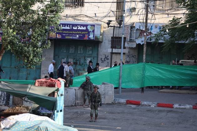 July 23, 2026, Hebron, Palestine, State of: HEBRON, WEST BANK Ã¢â‚¬ JULY 23, 2026: Israeli forces closed the central market and restricted the movement of Palestinians in the city of Hebron during a raid on the area to secure settlers access to the Tomb of the Patriarchs, where they performed Jewish prayers, on July 23, 2026. Hebron Palestine, State of - ZUMAq101 20260723_zna_q101_161 Copyright: xMosabxShawerx