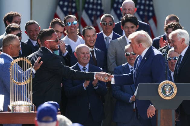 DC: Trump Hosts 2025 MLB World Series Champions LA Dodgers at White House Miguel Rojas shakes hands with President Donald Trump during an event with the 2025 MLB World Series Champions the Los Angeles Dodgers in the Rose Garden at the White House on July 23, 2026 in Washington, D.C. The Dodgers defeated the Toronto Blue Jays in Game 7 of the 2025 MLB World Series to claim back-to-back championship titles. (Photo by Samuel Corum Pool ABACAPRESS.COM) Washington DC United States  Copyright: xPool ABACAx