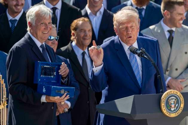 US President Donald J. Trump hosts an event to honor the 2025 World Series Champion Los Angeles Dodgers US President Donald J. Trump receives a World Series Championship ring from Dodgers owner Mark Walter during an event to honor the 2025 World Series Champion Los Angeles Dodgers in the Rose Garden at the White House in Washington, DC, USA, 23 July 2026. WASHINGTON DISTRICT OF COLUMBIA United States  Copyright: xPool ABACAx