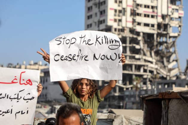 (260723) -- GAZA, July 23, 2026 -- Palestinians take part in a march to protest against Israeli plans for forced displacement in Gaza City, July 23, 2026. (Photo by Xinhua) MIDEAST-GAZA CITY-PROTEST RizekxAbdeljawad 