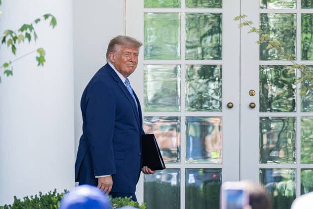 July 23, 2026, Washington, District Of Columbia, Unites States: U.S. President DONALD TRUMP walks out to the Rose Garden before a ceremony honoring the 2025 World Series champion Los Angeles Dodgers at the White House. Washington Unites States  - ZUMAk206 20260723_znp_k206_017 Copyright: xMattxKaminskyx