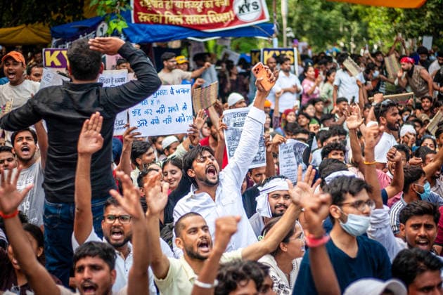 New Delhi Exam Leak Protest Youth demonstrators raise their hands and hold placards during the protest at Jantar Mantar in New Delhi, India, on July 23, 2026. The Cockroach Janta Party (CJP) organized the youth protest over national examination paper leaks, including NEET and CBSE examinations, and called for the resignation of Union Education Minister Dharmendra Pradhan. New Delhi Delhi India Copyright: xYousufxSarfarazx